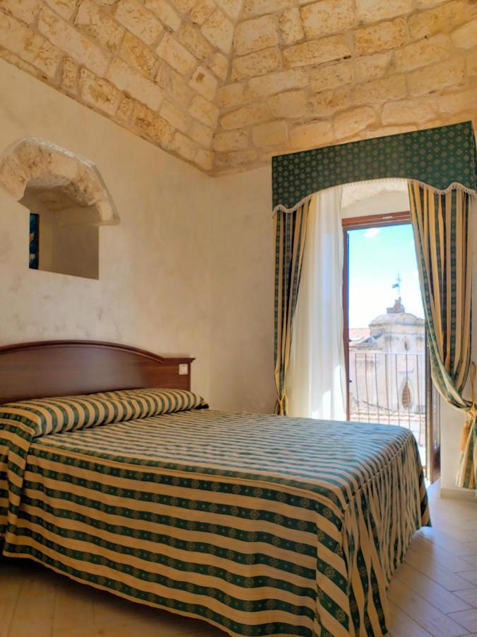 Rooms Dimora Arco - Affitti Brevi Italia Monte SantʼAngelo المظهر الخارجي الصورة